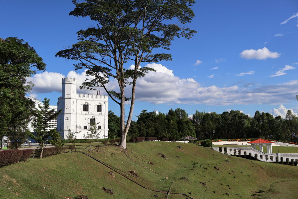 Fort Margherita in Kuching, Sarawak beneath clear blue skies, symbolising clean air, good weather, and a peaceful lifestyle ideal for retirement.